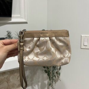 Signature Coach Metallic Gold and Cream Wristlet